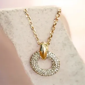 Kendra Scott Mikki Pave Pendant Necklace is a gold-toned necklace thumbnail 3