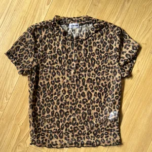 Brown Leopard Print Short Sleeve mesh top Size XS thumbnail 1
