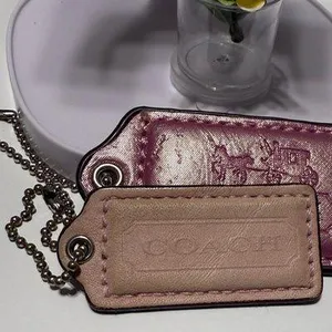 Coach light pink tag thumbnail 2