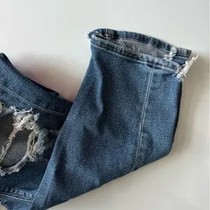 American Eagle Outfitters • Medium Wash Destructed Mom Jeans thumbnail 2