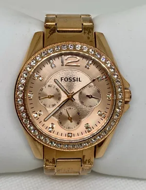 Fossil women watch ES-2811 day date hours rose gold tone 38mm size 6.5” running thumbnail 1