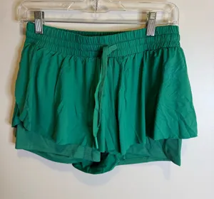 Green running shorts  thumbnail 1