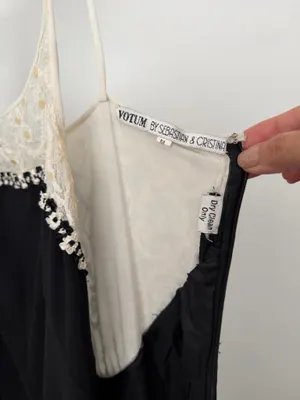 Elegant black maxi dress featuring a delicate cream lace yoke and thin straps. thumbnail 5