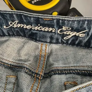 American Eagle Womens Denim Shorts Distressed Raw Hem Blue Size 4 thumbnail 5