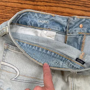 American Eagle Outfitters Distressed Blue shortie Jean Shorts. Waist 32 in thumbnail 4