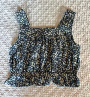 Floral peplum top thumbnail 1