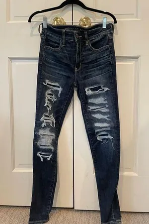 Women's American Eagle Distressed Dark Denim Skinny Jeans thumbnail 1