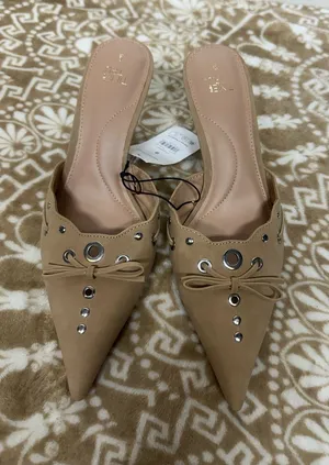 Time and Tru Pointed Mule Slides in Taupe with Silver Eyelet Accents thumbnail 1