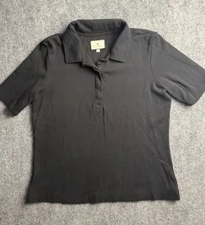 Tuckernuck Woman’s Medium classic black short-sleeve polo shirt thumbnail 1