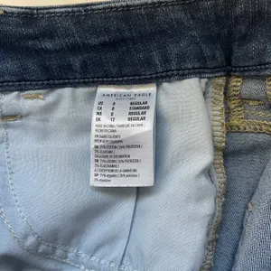 American Eagle Dark Wash Super High Rise Ripped Curvy Skinny Jeans thumbnail 12