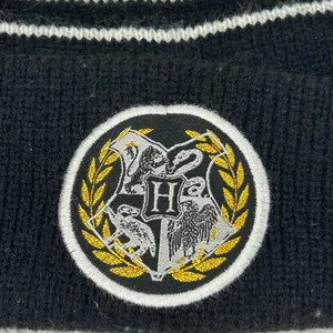 Harry Potter Hogwarts Crest Knit Beanie Hat One Size Black Gold‎ White thumbnail 4