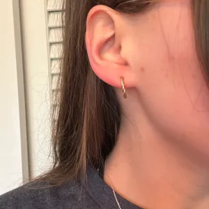 Twisted gold hoop earrings H&M thumbnail 1
