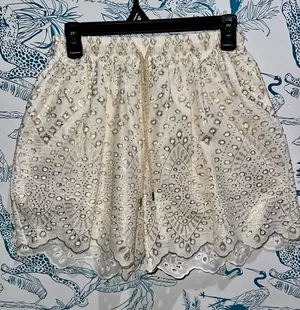High-Waist Cream Embroidered Eyelet Shorts with Gold Accents thumbnail 1