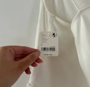 Free People White Prima Shortsie Workout Athletic Romper NWT Size Large thumbnail 2