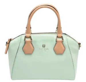 Kate Spade NEW YORK-MINT MOJITO PIPPA PARNELL STREET LEATHER SATCHEL Perfect spring bag, mint green white tan handle and crossbody strap, top zip closure, stripe print interior, inside zip pocket, inside two open pockets, amazing condition, there are two call outs, a small smudge on the bottom of the bag and a small smudge on one corner, please see the last two pictures **This bag is preowned and is being sold as is** thumbnail 1