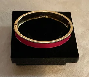 Gold-Tone Hinged Bracelet with Pink Enamel Inlay thumbnail 1