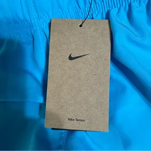 Nike Women’s Tempo Dri-Fit Mid-Rise 3 Inch Running Shorts thumbnail 11