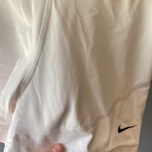 Women’s white nike pros thumbnail 3