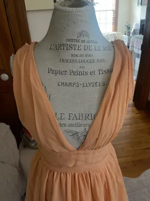 This orange Abercrombie & Fitch mini dress features a deep V-neckline, a ruched waistband, and a flared chiffon skirt thumbnail 2