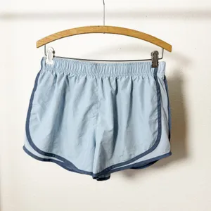 Nike‎ Dri Fit Running Shorts Light Blue Dolphin Hem Athletic Womens Size L thumbnail 4