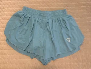 Blue pleated butterfly shorts with built-in spandex thumbnail 1