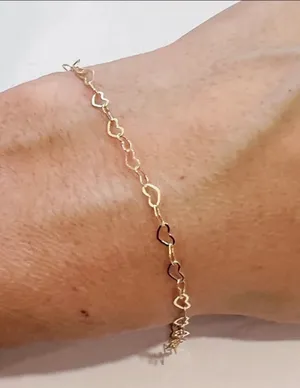 GOLD BRACELET WITH A GOLDEN HEART thumbnail 1