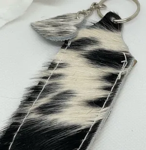 Cowhide chapstick holder. Attach to purse or backpack to keep it handy! thumbnail 1