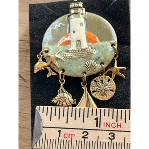 Lighthouse-Themed Enamel Brooch With Nautical Charms & Gold Accents Measures App thumbnail 6