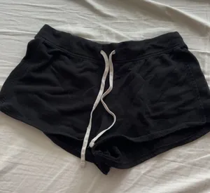 Old Navy low rise mini black shorts with white drawstring, size S  thumbnail 1