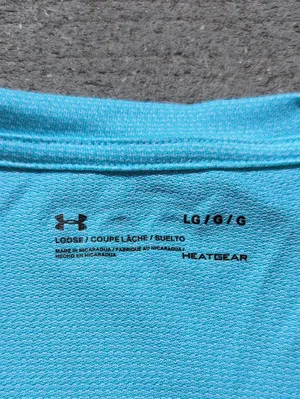 Under Armour Women's Loose Fit V-Neck Short Sleeve Shirt | Hear Gear thumbnail 3