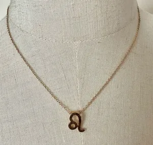 Leo zodiac sign gold tone pendant necklace thumbnail 1
