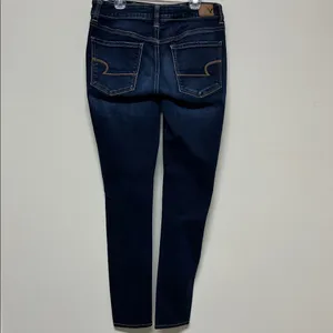 NWOT American Eagle Super Stretch Hi-Rise Jegging size 8 with acid washed areas thumbnail 9