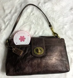 y2k COACH Bronze Turnlock Wristlet thumbnail 1
