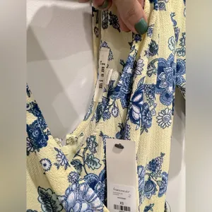 Francesca’s Blue and Yellow Floral Romper Size XS NWT thumbnail 2