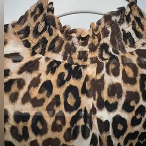 Express Size Medium Leopard Print Smocked Mock Neck Tie-Front Top. Preloved thumbnail 6