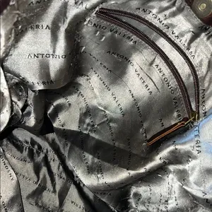 Antonio Valeria is a former Spacious Brown Leather Tote with Minimalist Design thumbnail 9