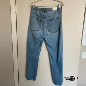 Express Super High Waisted Light Wash Raw Hem Slim Jeans thumbnail 5