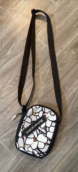 Sherpani Rogue mini crossbody bag Magnolia pattern EUC w/ RFID thumbnail 1