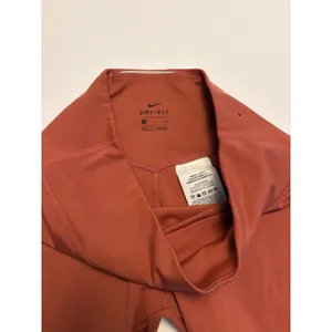 Nike Dri-FIT Leggings Womens Small Terracotta Burnt Orange High Waisted Cropped thumbnail 4
