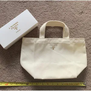 NIB Prada L'Homme White Canvas Tote thumbnail 1