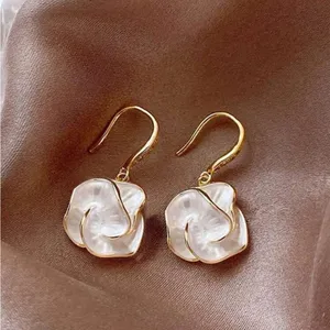 Gold and White Floral Earrings thumbnail 3