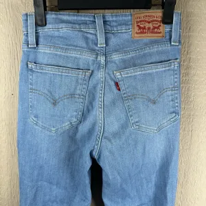 Levi's 726 High Rise Flare Jeans Womens 26 Blue Distressed Ripped Denim Stretch thumbnail 4