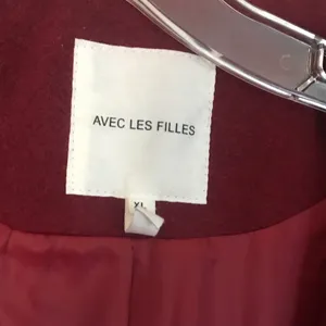 Avec Les Filles Hooded Twill Wrap Coat In Maroon (No Belt) Nordstrom Cut Off Tag Size Xl Reg Look polished on the go in this timelessly chic wrap coat with an expansive hood for blustery days and handwarming welt pockets. • 38 1/2" length (size Medium) • Double-breasted button closure • Fixed hood • Shawl collar • Lined • 46% polyester, 29% acrylic, 9% wool, 9% rayon, 5% nylon, 2% cotton • Dry clean • Imported • Item # 6236110 Belt is not included thumbnail 6