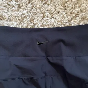 NWT NIKE Dri-FIT Bliss Mid-Rise 7/8 Joggers thumbnail 8