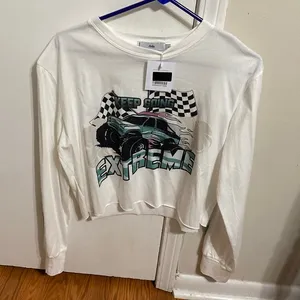 Never worn cropped Adika t shirt thumbnail 1