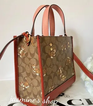 Coach Dempsey Tote 22 In Signature Canvas With Dancing Kitten Print thumbnail 2