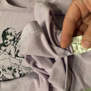 SHEIN Purple Lavender Short Sleeve Angel Baby Graphic Tee Size Small thumbnail 3