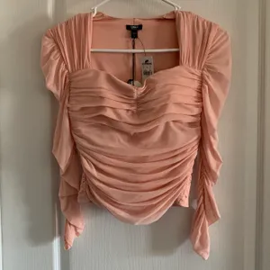 Women’s XS Body Contour Light Pink Mesh Padded Cropped Top NWT thumbnail 1