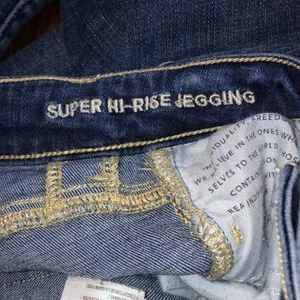 Size 0 Short American Eagle Stretchy Blue Distressed Skinny Jeans thumbnail 6