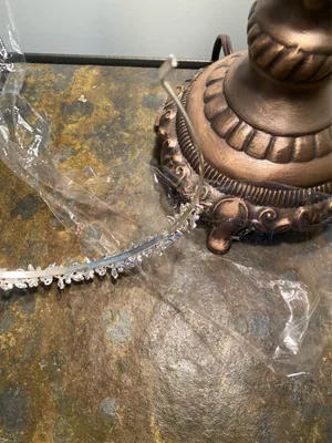 Silver metal headband with flowers and rhinestones on a vine thumbnail 4